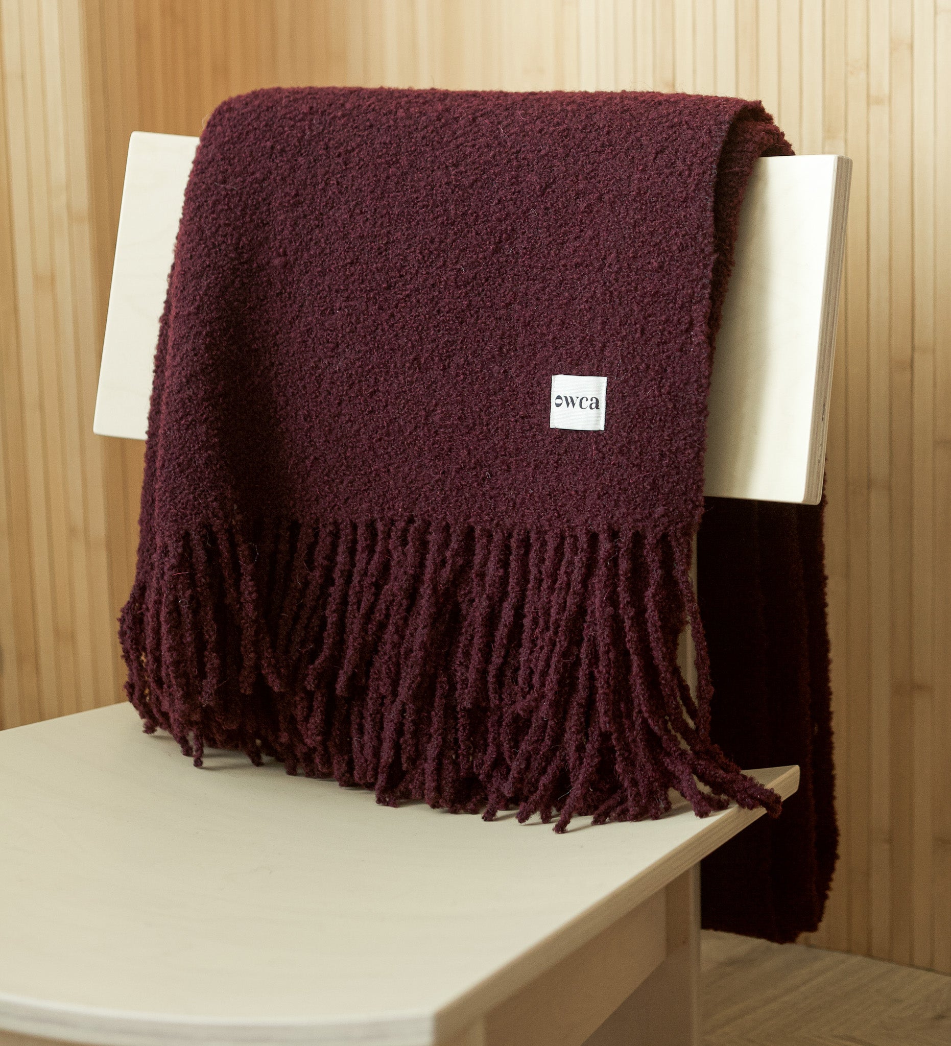 HELIOS Merino boucle blanket with fringe - sage green