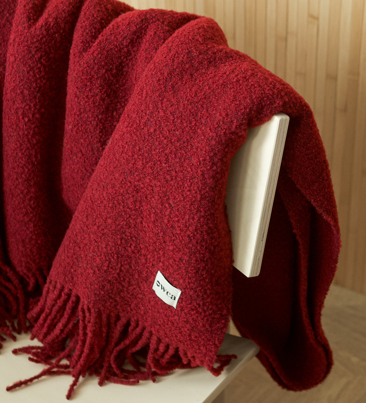 HELIOS Merino boucle blanket with fringe - sage green